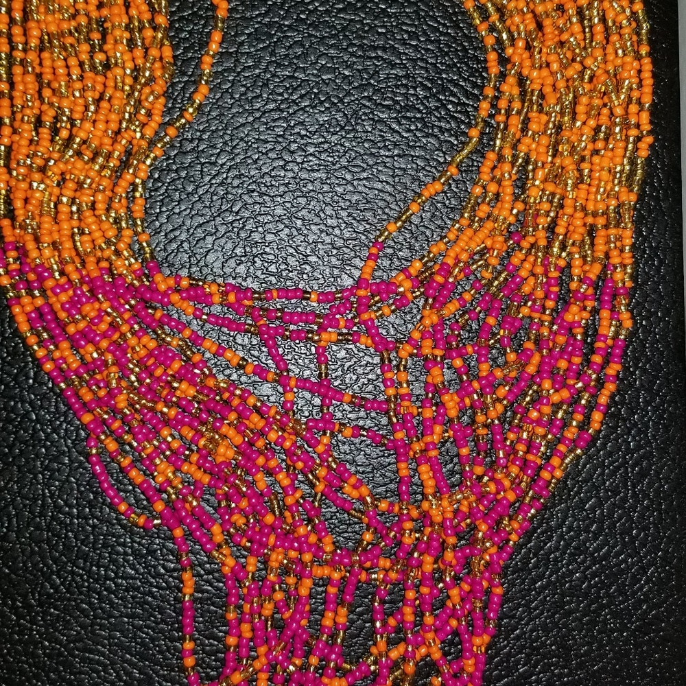 Multistrand bead necklace orange/ fucsia